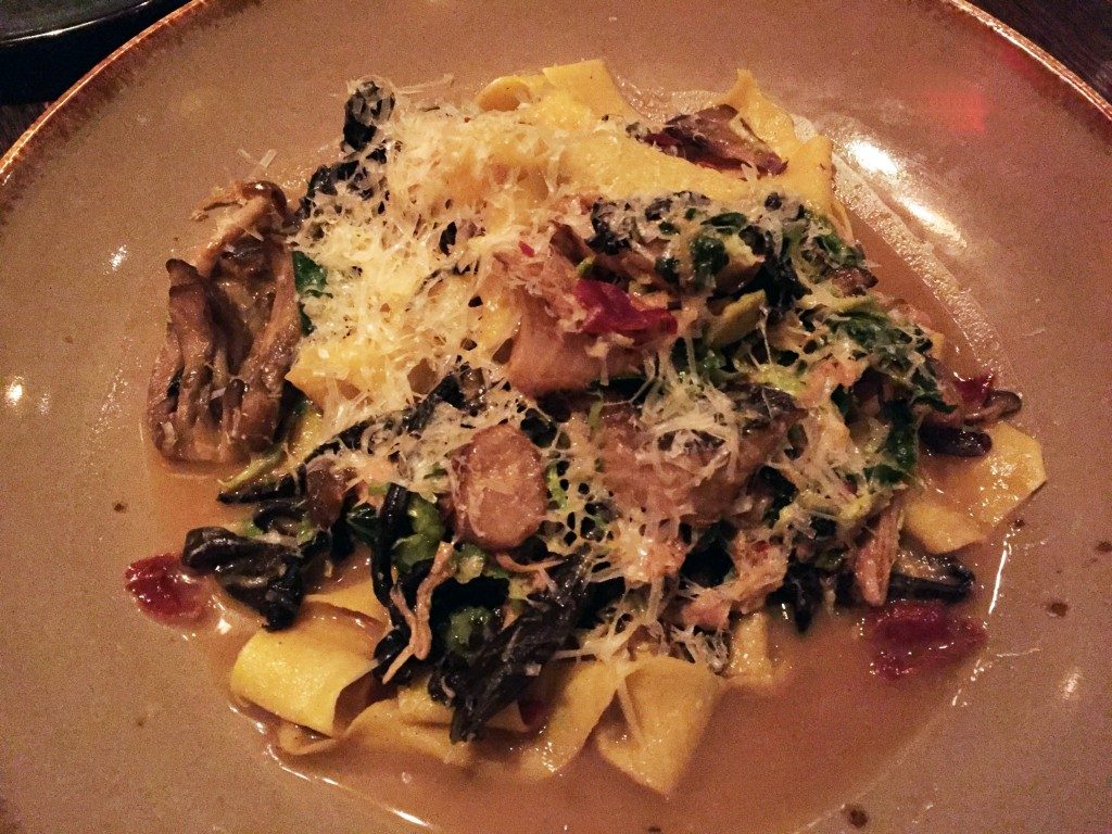 housemade pappardelle pasta studded with braised rabbit and crispy Brussels sprouts